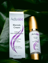 Load image into Gallery viewer, Adize64 Blemish Cream 50 ml bottle and carton against green leaves